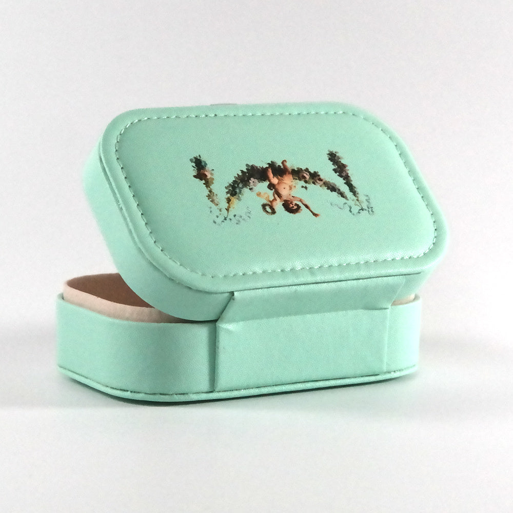 Miniature teal jewelry box with a button closure and a cupid on a floral garland, pictured from the back.