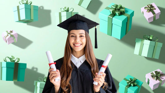 Young woman in graduation cap and gown holding diplomas surrounded by teal gift boxes — graduation gift ideas for her