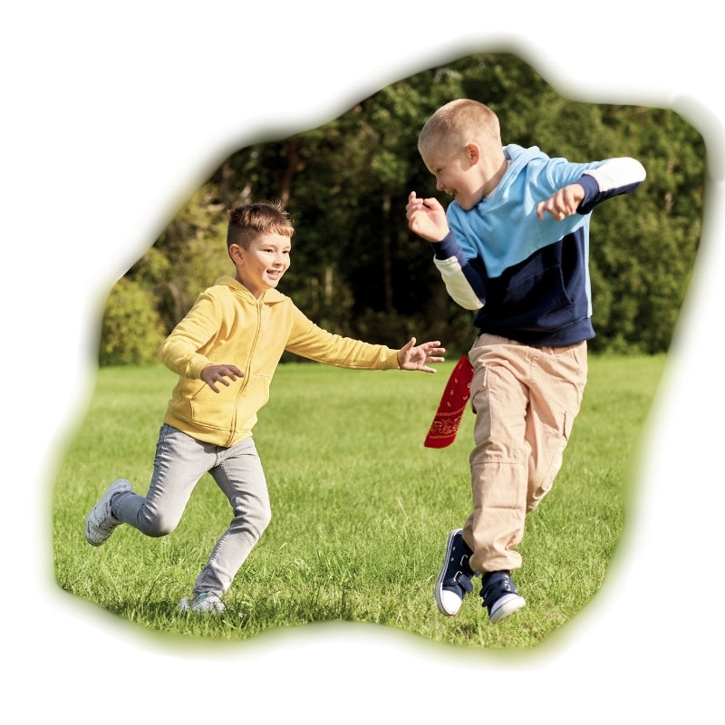 A black and white hand-drawn style illustration of two children running and playing, with one child holding an orange bandana on his waist and the other kid reaching for it, on a plain white background.