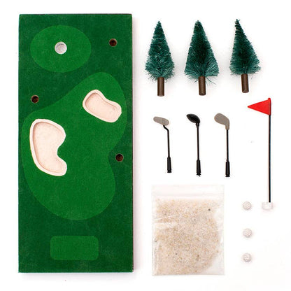 Contents of the Desktop Mini Golf Set, including 3 golf balls, 3 clubs, 3 trees, 1 flag, and quartz sand