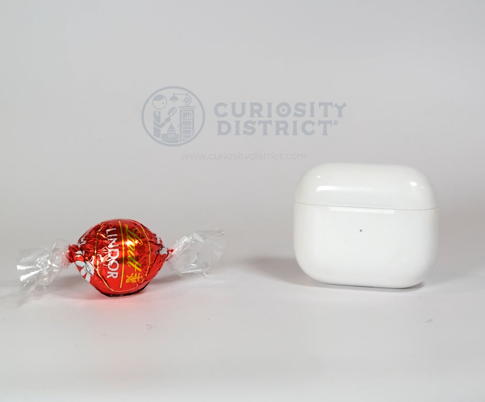 Size comparison of Lindt Milk Chocolate Truffle with EarPods case