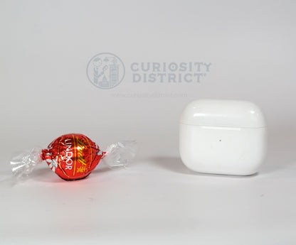 Size comparison of Lindt Milk Chocolate Truffle with EarPods case