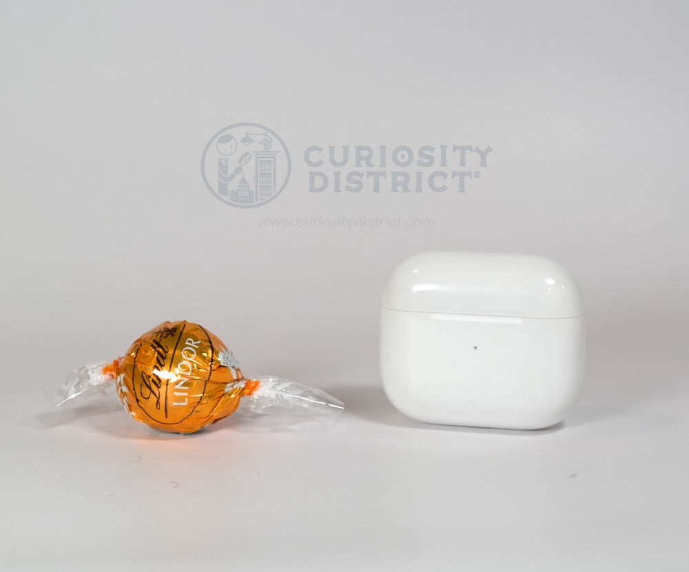 Size comparison of Lindt Caramel Chocolate Truffle with EarPods case