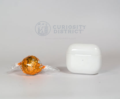 Size comparison of Lindt Caramel Chocolate Truffle with EarPods case