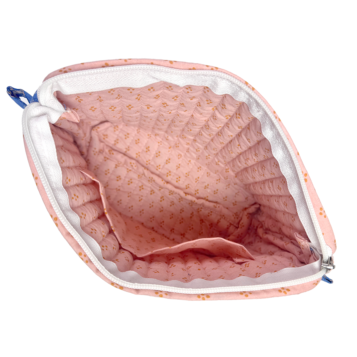 Top view of the Penny Pouch with open zipper