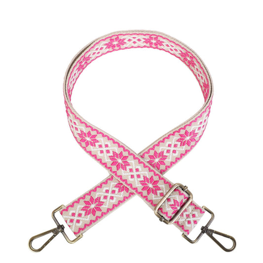 Pink and white floral patterned strap with metal clasps on a white background