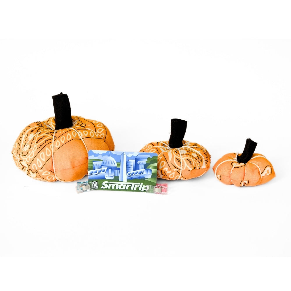 Three sizes of handmade bandana pumpkins shown beside a DC SmarTrip card for scale