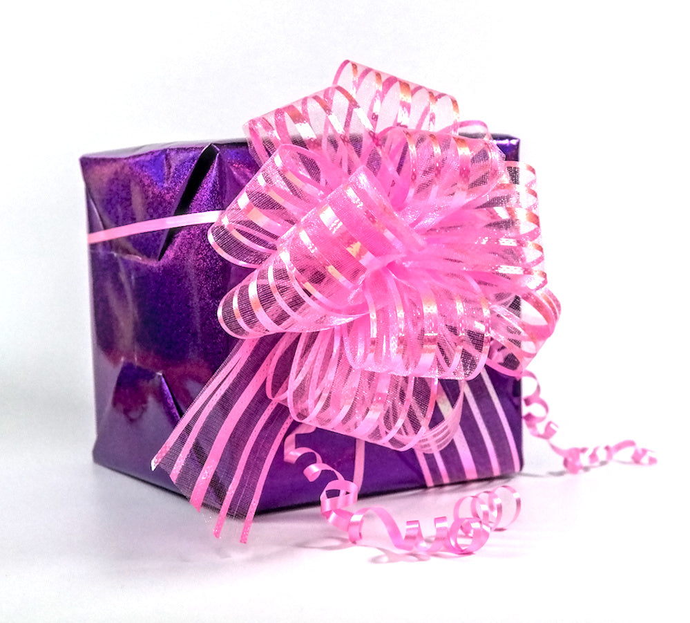 Purple gift box with a pink ribbon on a white background
