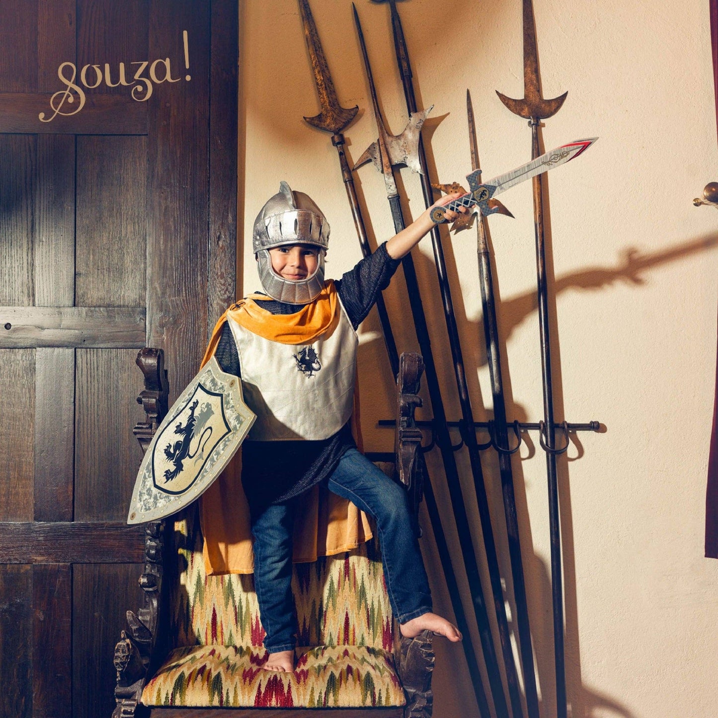 Kid dressed up as knight 