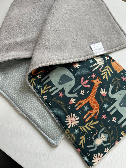 Image of the two Signature Burp Cloth with Jungle design, showing front and back. 