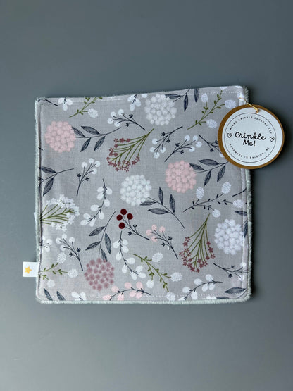 Front view of the Signature Minky Crinkle Sensory Toy, Grey Wildflowers design