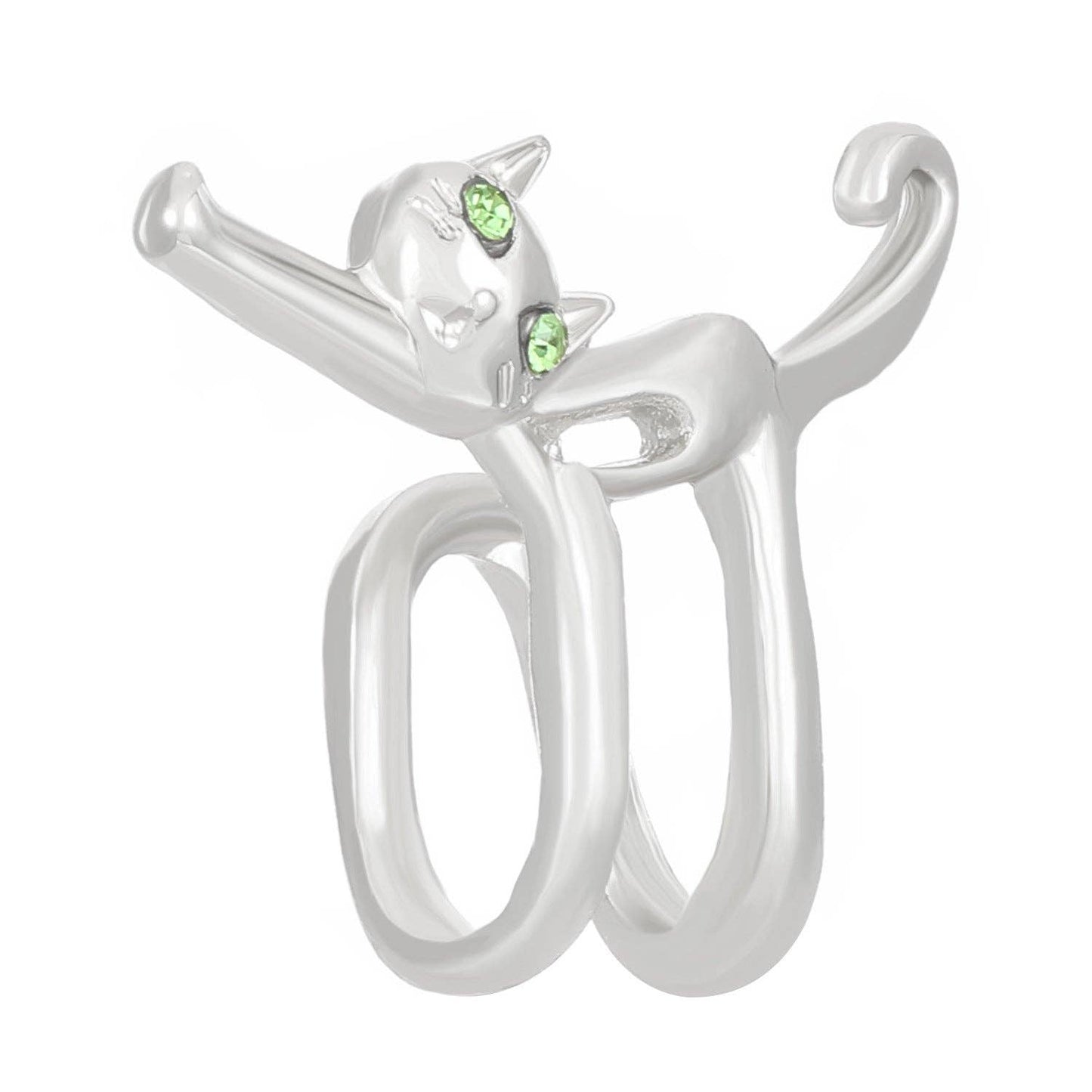 Silver cat-shaped ring with green gemstones on a white background