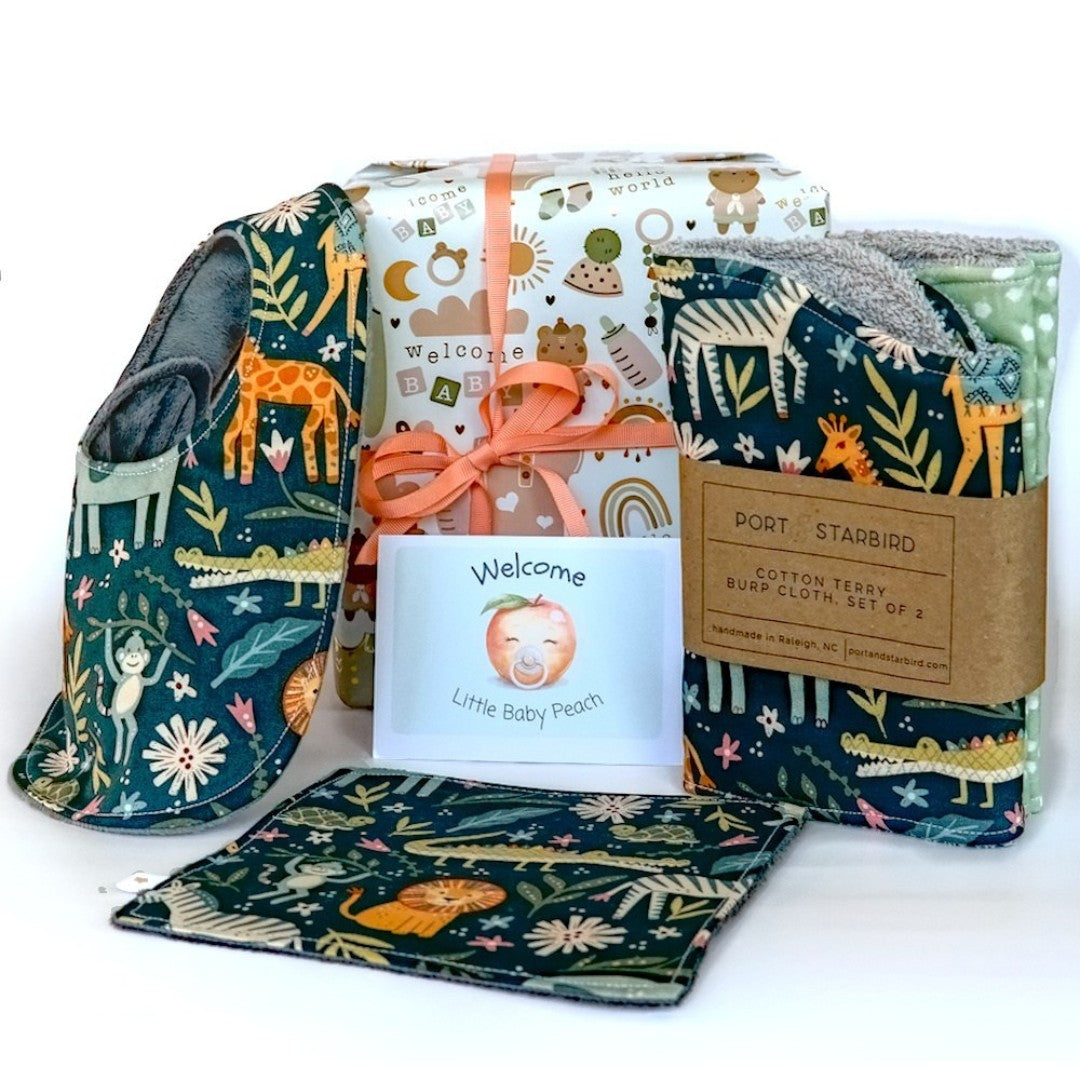 Baby product set with jungle animal-themed designs on a white background